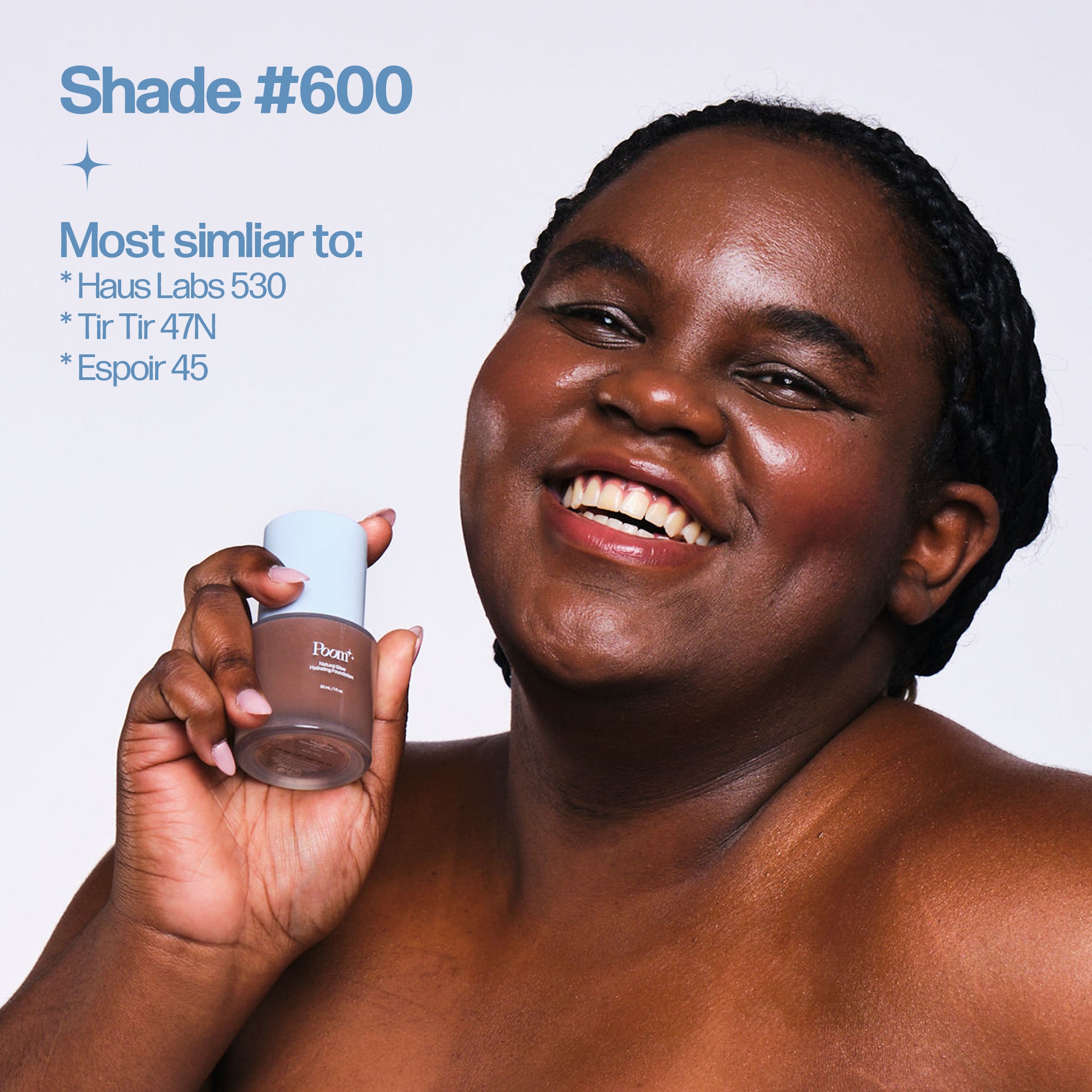 Woman holding a bottle of foundation with shade #600 information on a white background