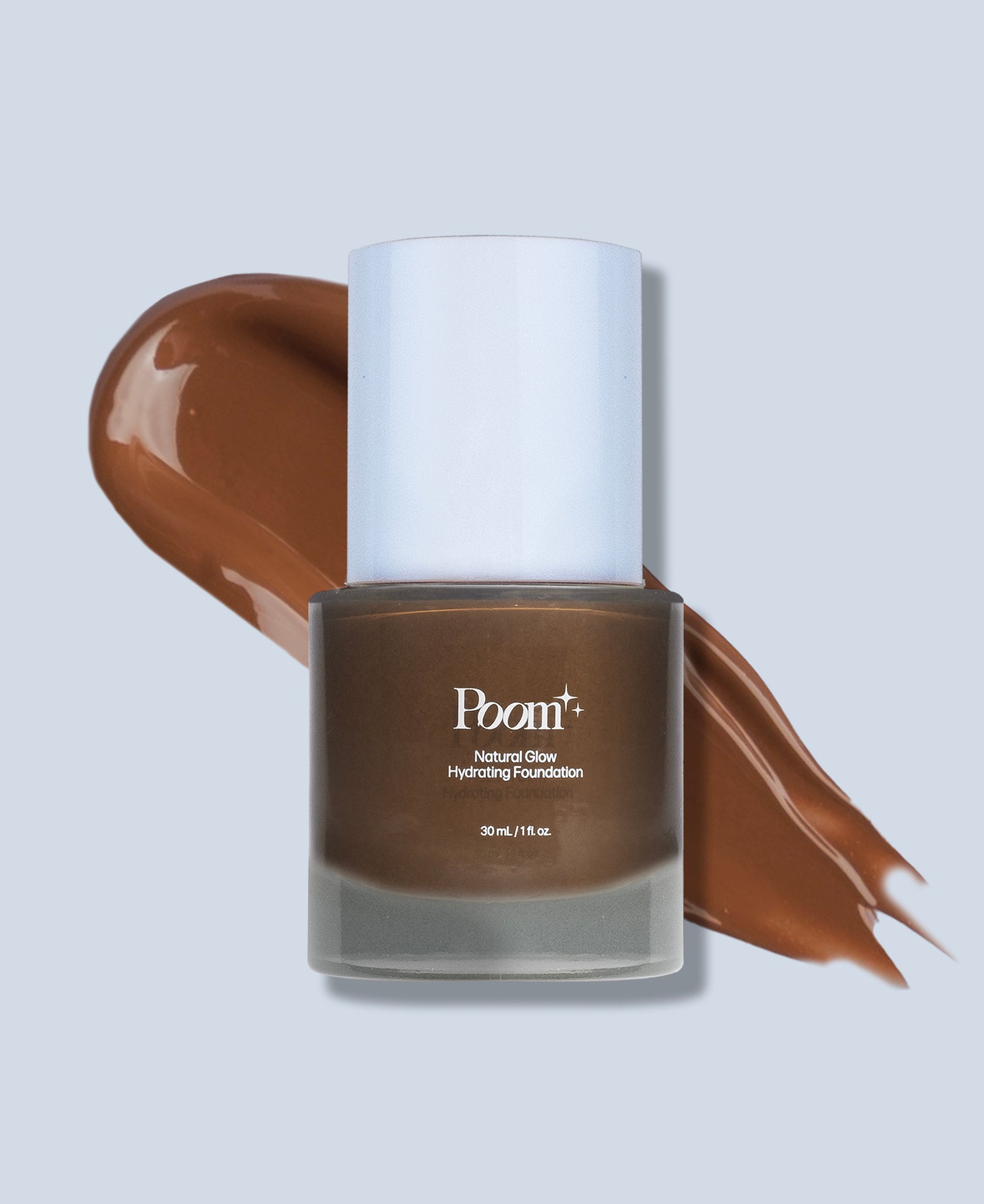 a brown liquid foundation with a white lid